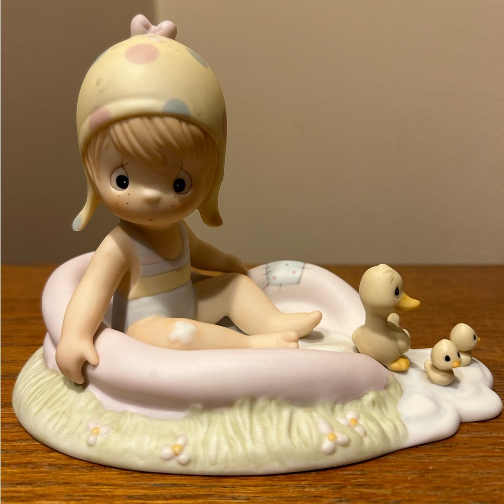 Precious Moments August figurine